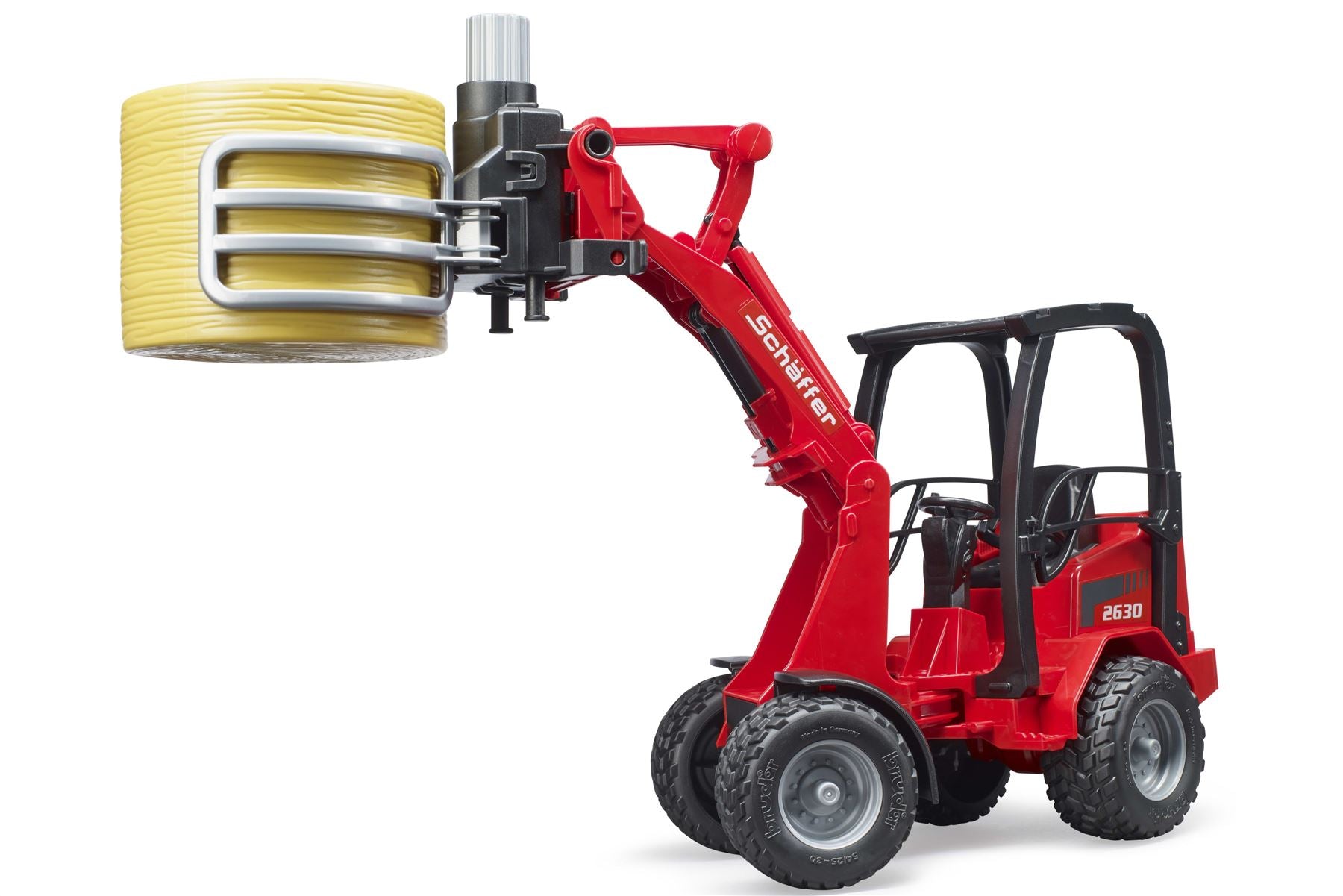 Schäffer Compact loader 2630 with bale gripper+1 round bale