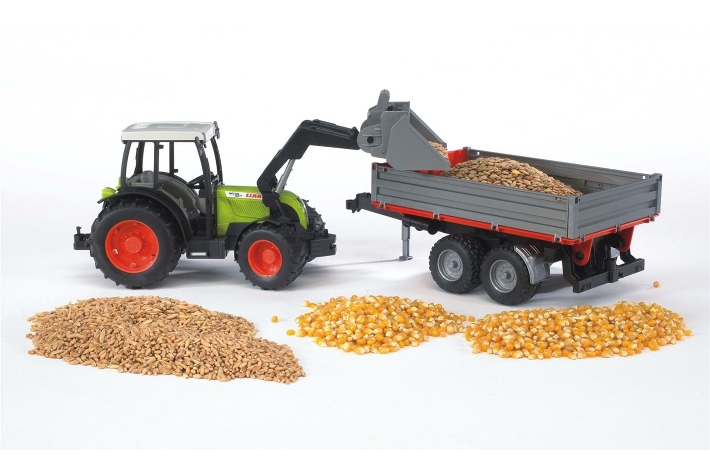 Claas Nectis 267 F with frontloader and tipping trailer