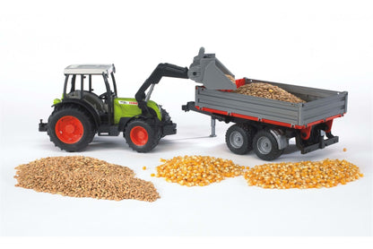 Claas Nectis 267 F with frontloader and tipping trailer