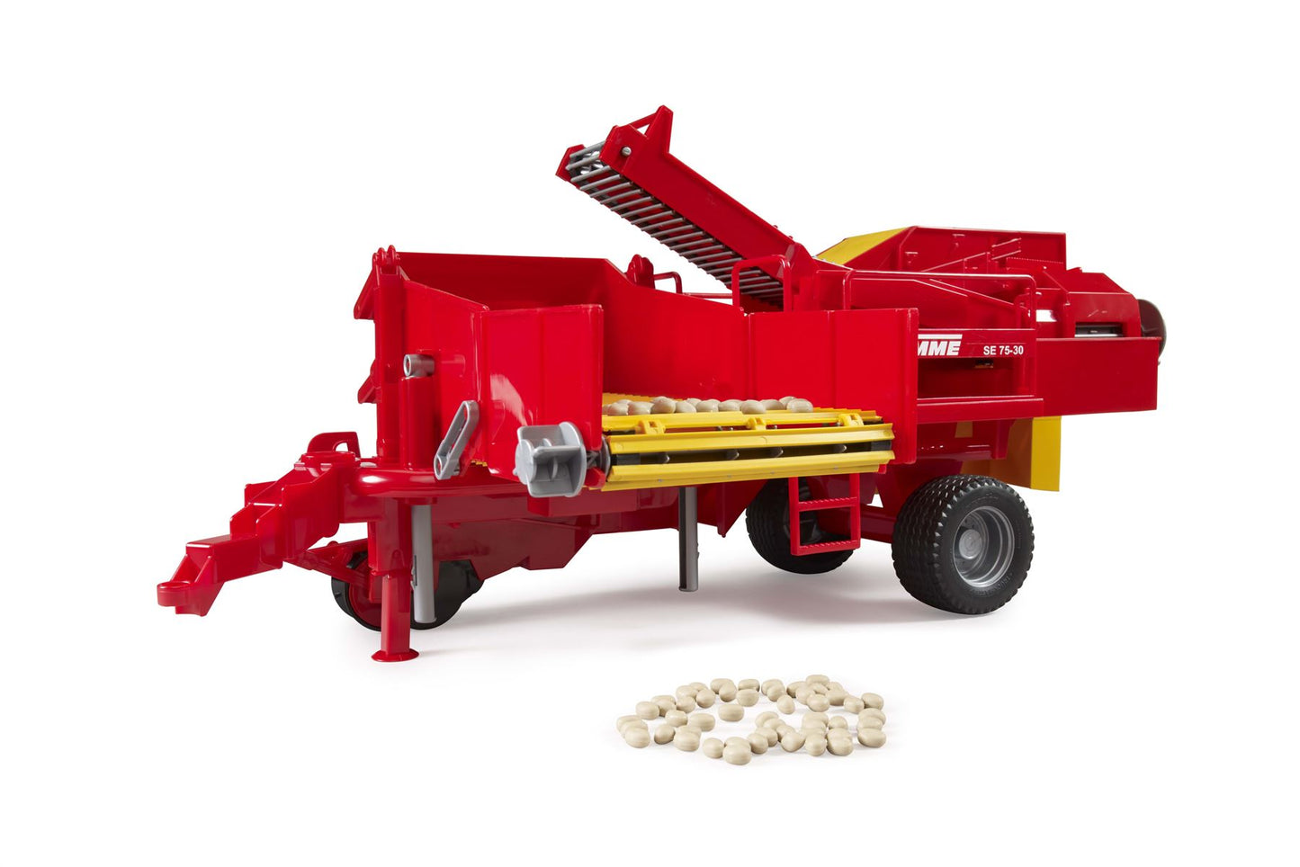 Grimme SE 75-30 potato digger with potatoes-imitations