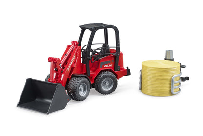 Schäffer Compact loader 2630 with bale gripper+1 round bale