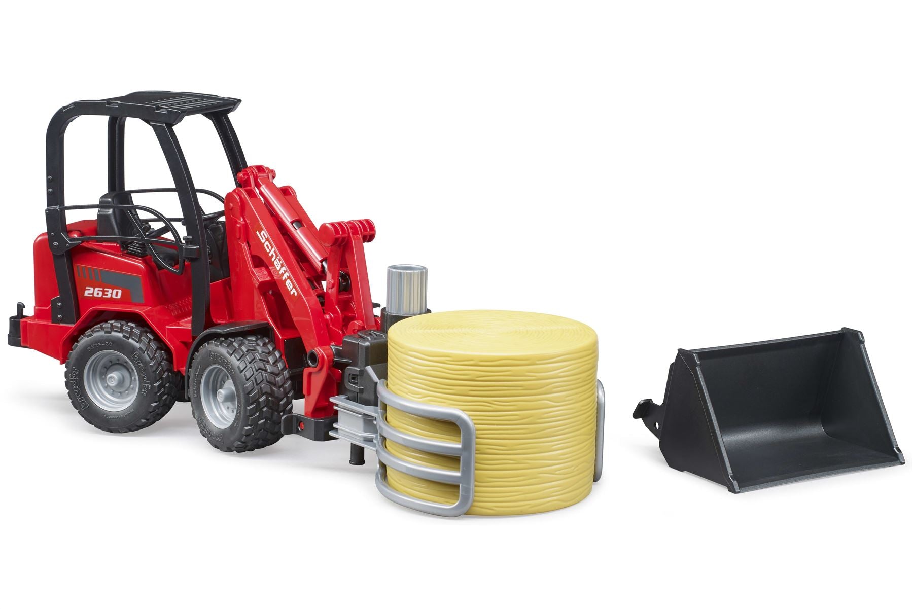 Schäffer Compact loader 2630 with bale gripper+1 round bale