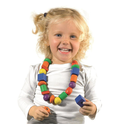 I learn to thread beads