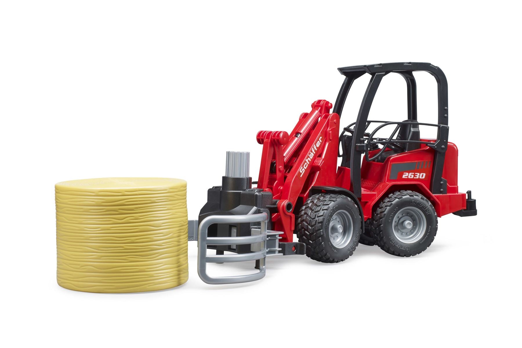 Schäffer Compact loader 2630 with bale gripper+1 round bale