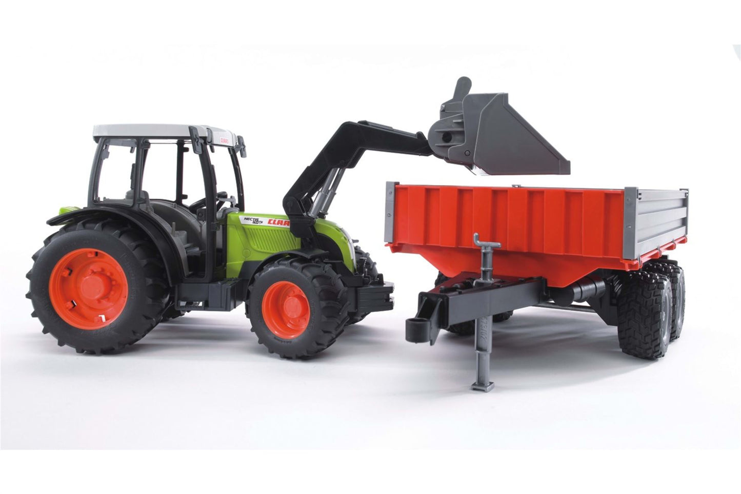 Claas Nectis 267 F with frontloader and tipping trailer