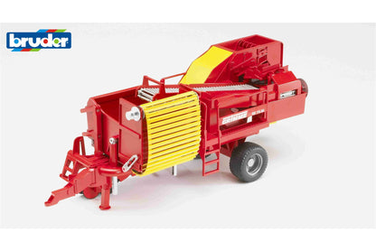 Grimme SE 75-30 potato digger with potatoes-imitations