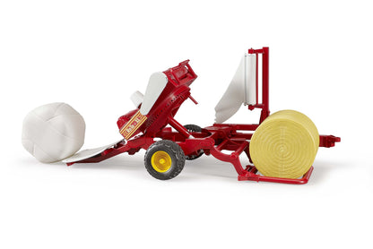 Bale wrapper with ochre and white round bales